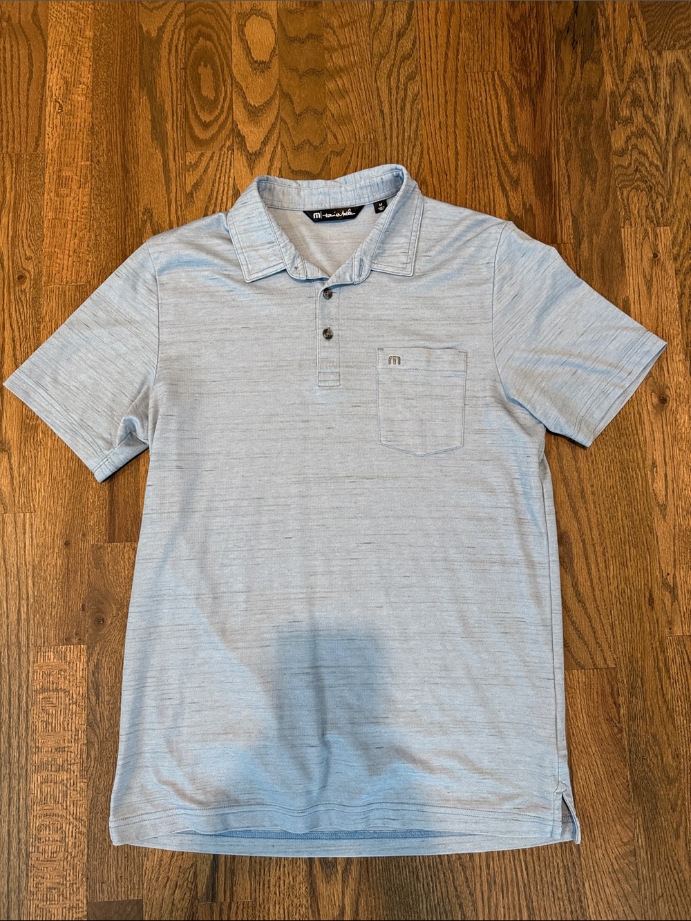 Travis Mathew Men's Heather Light Blue Polo with Chest Pocket | Size M